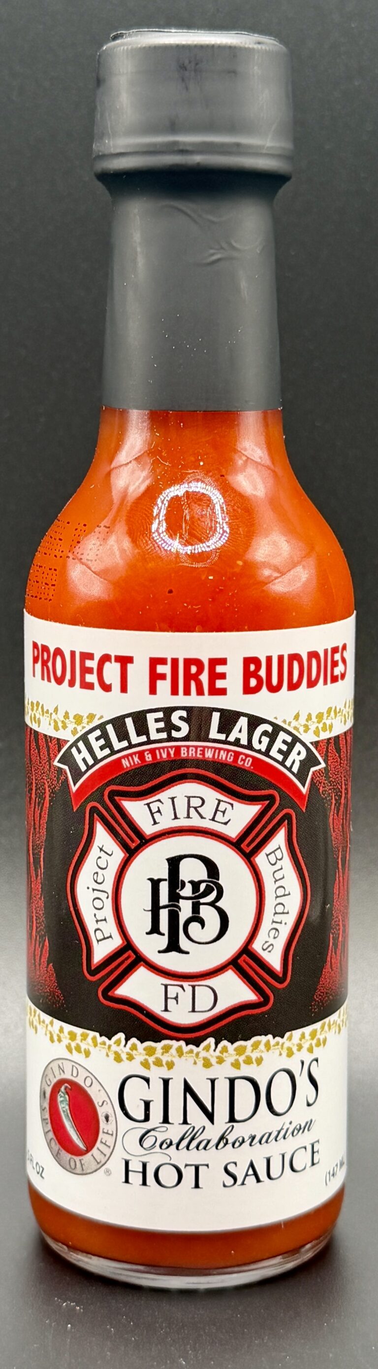 Gindo’s – Project Fire buddies Nik & Ivy Helles Lager Hot Sauce
